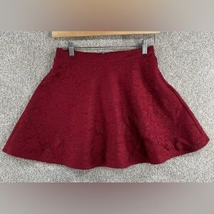Forever 21 Red Laced Skirt in Large. Waist stretches 15”-18,” skirt is 17” long.